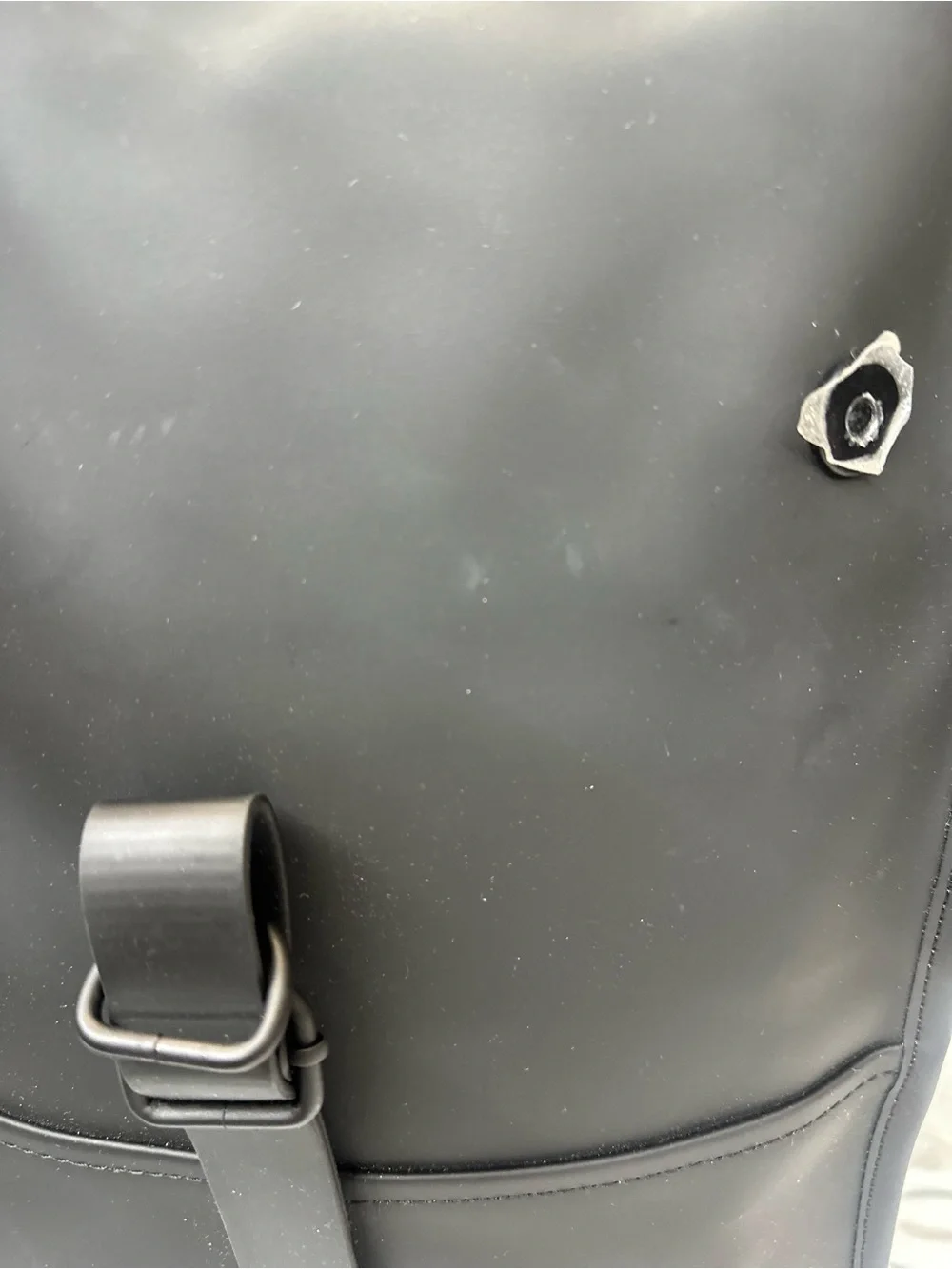 Rains  Backpack is clean and ever-contemporary. Like new no tag